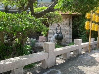 Under a blue sky, a vast ancient battlefield set, awaiting historical reenactment