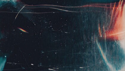 distressed glass texture with cyan vertical streaks, red light leaks, and fine cracks on black surface for abstract background, digital design, print texture, or glitch art element

