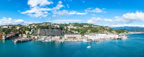 Savona, Italy with port and hillside buildings, panoramic coastal view