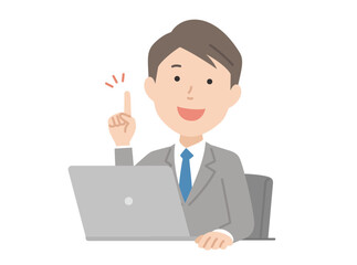 パソコンで指をさすスーツの男性