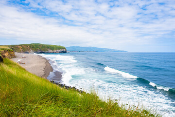 View of Santa Barbara beach and ocean bay in Ribeira Grande town, Sao Miguel island, Azores, Portugal