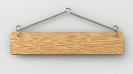 Empty light brown wooden sign hanging on a metal hanger.