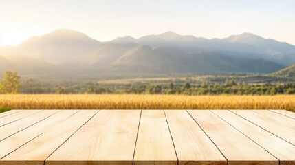 Empty wooden table against scenic mountain landscape at sunrise
