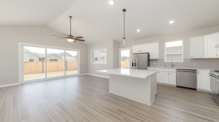 Open concept kitchen and dining area with large windows.