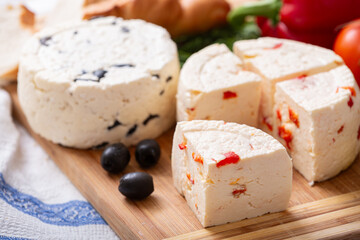 Homemade organic white cheese served with Tomatoes, dill, crispy bread, walnut and olive oil on...