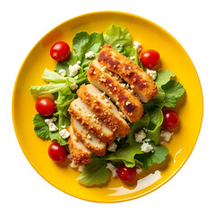 A yellow plate with sliced chicken salad with lettuce tomatoes and cheese view from above isolated on transparent background