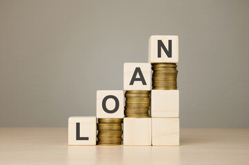 chart made of wooden cubes with the word loan