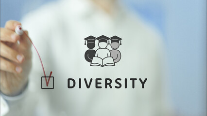 University professor pointing at diversity and inclusion symbol on transparent board, highlighting...