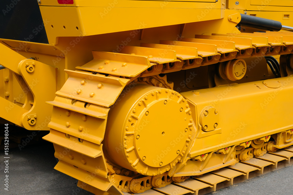 Poster Tractor track on roller close up machine part many bolts and screws сoncept complexity precision, many parts fasteners work together create functioning machine