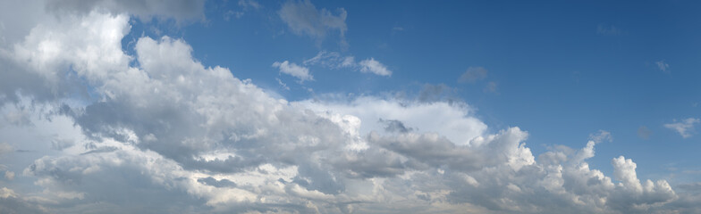 Obraz premium heaven sky is blue and cloudy. clouds are white and fluffy. The sky is clear and bright.