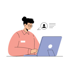 Young woman typing on laptop while communicating in modern office  