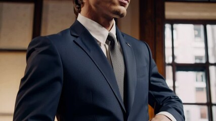 Elegant businessman adjusting watch in modern office environment reflecting professionalism punctuality executive lifestyle confidence business success