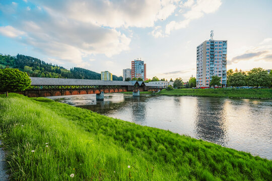 Wooden bridge with river in Dolny Kubin in orava region in summer