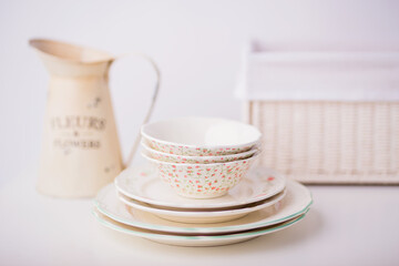 Closeup of porcelain plates and bowls