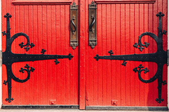 old red door with metal