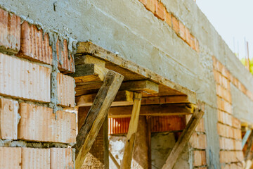construction residential new house in progress at building site. High quality photo