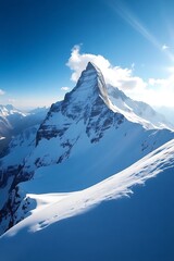 Majestic Mountain Peak A Breathtaking View of Snow-Capped Summits Under a Vivid Blue Sky