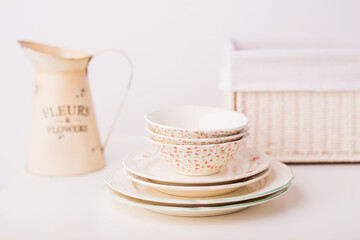 Closeup of porcelain plates and bowls