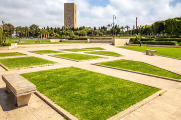 Hassan Tower ancient incomplete mosque minaret and green park in the foreground, Rabat, Morocco