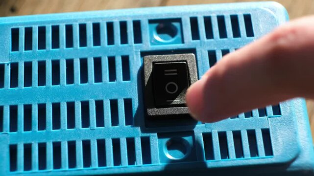 Finger pushes on KCD1-101 6c Rocker Switch electrical component rocker-style actuator for on off on control. Offers as a simple reliable switching mechanism, with a durable. High quality 4k footage.