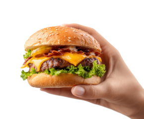 Juicy burger with lettuce and cheese held by a hand