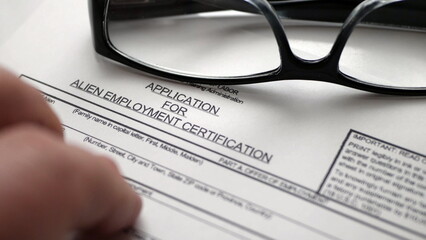 Finger tapping on application for alien employment