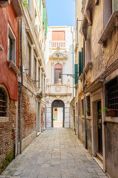Typical narrow street in Venice, Italy