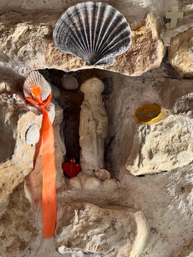Stone pilgrim statue in wayside shrine on the Camino Portugu&ecirc;s
