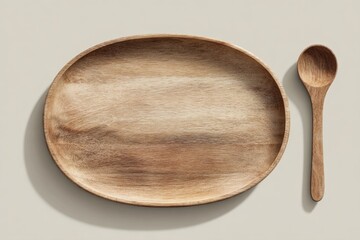 Oval wooden serving platter and spoon on a neutral background, cast shadows visible