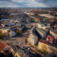 Main road in Podgorze district in Krakow, Poland during sunset at golden hour. Soft light, afternoon.