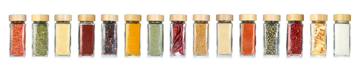 Different spices in glass jars on white background, set