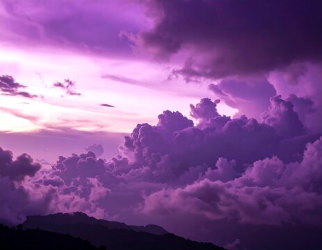 Purple sunset clouds over mountains