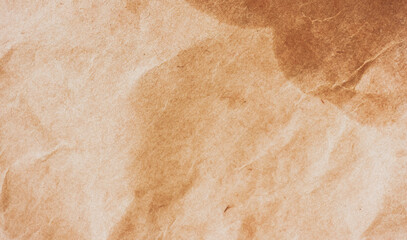 Textured Brown Cardboard Paper With Close-up View Creases and Folds Creates an Organic Visual...
