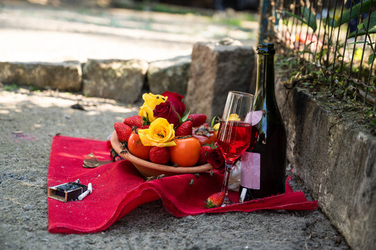 Brazilian Umbanda religious delivery to Pombagira with flowers, fruits and champagne. Popularly known as macumba.