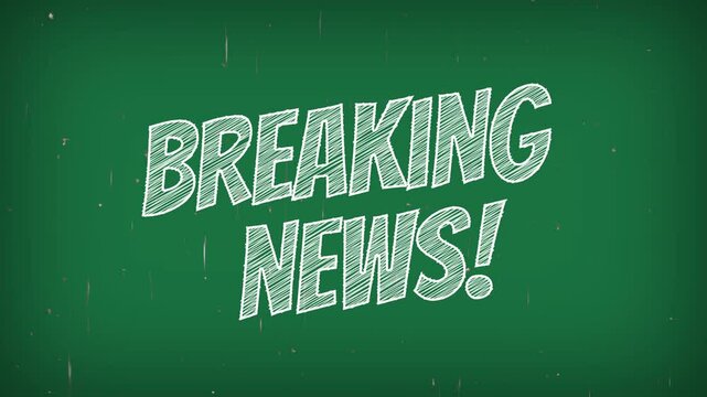The word "Breaking News" written in white chalk on a green background.