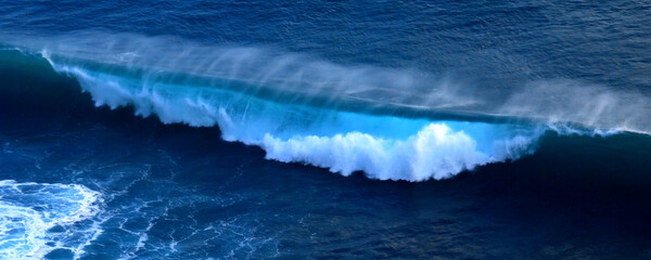 Fototapeta premium Banner Turquoise ocean sea water white wave pattern splashing deep blue sea. Banner Tropical sea beach Seascape dark background wave splash on rock. Summer Ocean Surface big wave with copy space