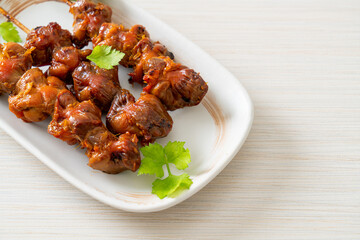 grilled chicken gizzard skewer with herbs and spices