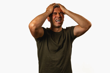 Man experiencing distress during an emotional moment indoors