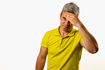 Man showing frustration in a simple studio setting