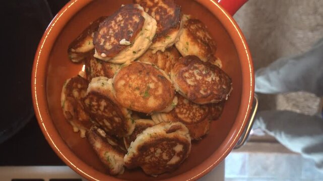Hirtshals Denmark Fried fish frikadeller or fish balls, a Danish food speciality, in a serving dish.