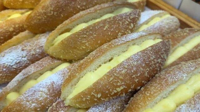 cream bun close-up shot Maritozzi, a typical Italian dessert filled with whipped cream. Italian cuisine and desserts