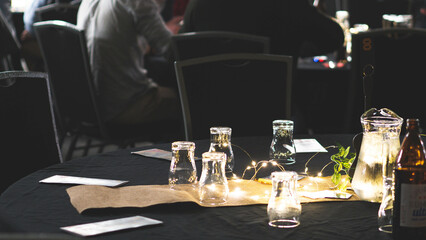 Glasses of champagne wine sparkling on the table lighting evening dinner 