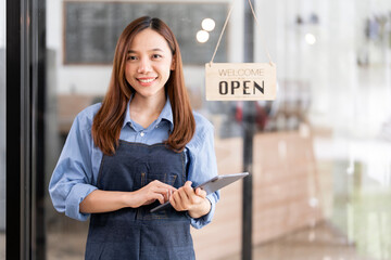 Startup successful small business owner sme beauty girl stand with arms crossed in coffee shop restaurant. Portrait of asian tan woman barista cafe owner SME