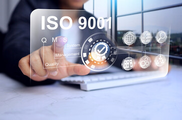 iso 9001 quality management system concept with businessman pointing on vr virtual screen to...