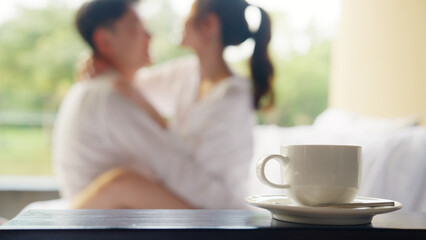 Blurred asia people young adult body on hotel cozy sofa bed outdoor home in health care safe sex flirt relax hug kiss. I love you man woman falling in love tender sexual pose happy asian just married. © ChayTee