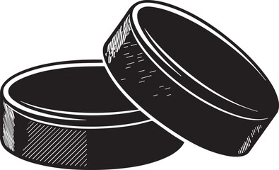 black hockey pucks in a close-up shot
