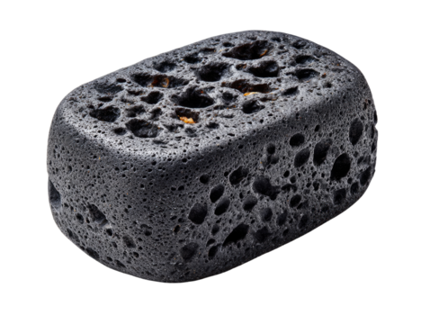 Pumice Stone Close-up: A close-up captures the unique texture of a pumice stone, a porous volcanic rock, highlighting its intricate details and natural formation.
