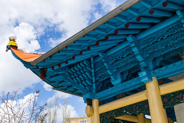 carved wooden roof of Dungan mosque in Karakol, Kyrgyzstan. Travel landmark