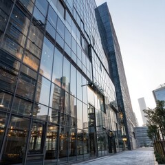 Urban building with a glass facade reflecting the surrounding city, giving a dynamic modern look.