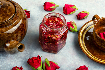 Rose jam in a glass jar.